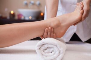 woman getting reflexology massage at the spa in orlando