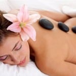 Orlando woman getting hot stone massage at The Spa